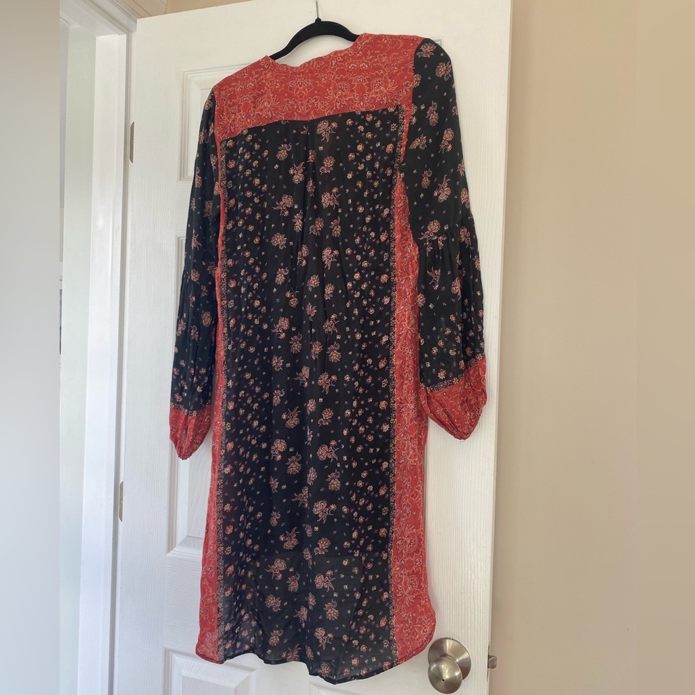 Peacemaker Boho Dress by Free People- condition is new with out tags